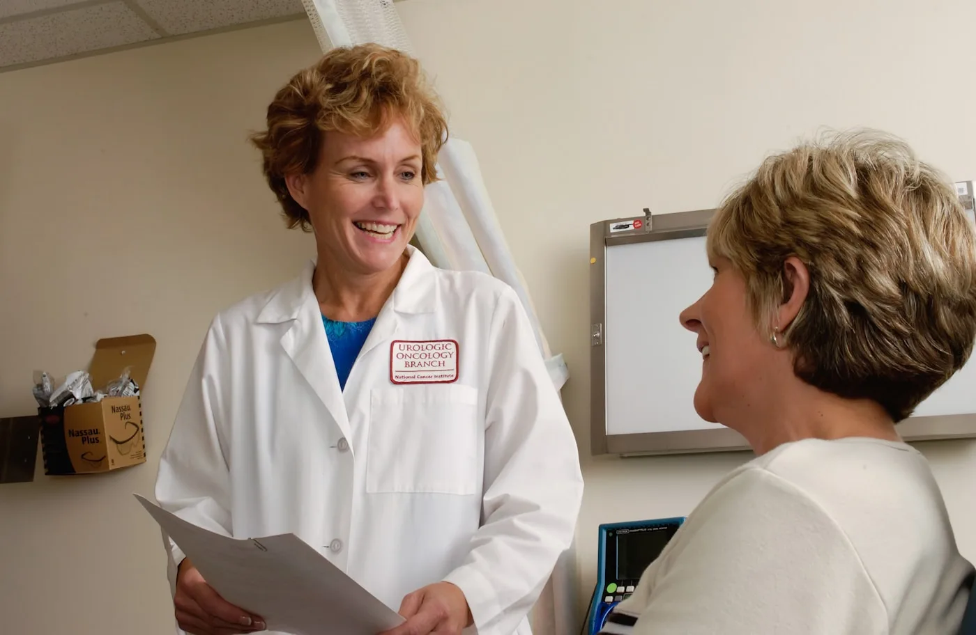 Bright modern clinic corridor — patient access and operations without adding clinical risk