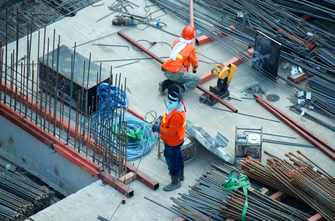 Field technicians in safety gear — the crews and routes your phone line has to feed