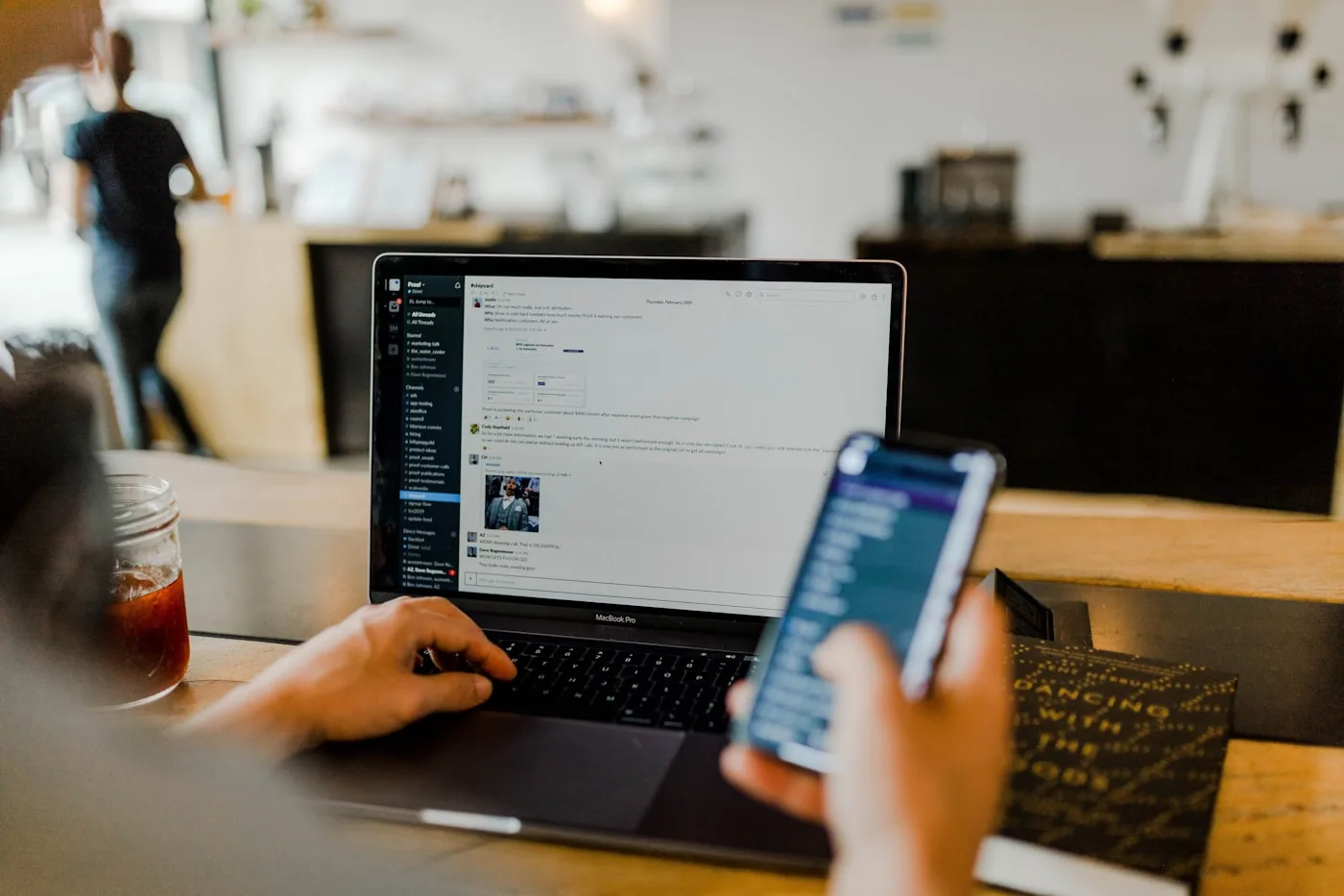 Business professional on a phone call at a desk — voice reception and routing